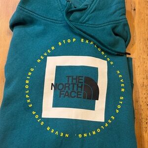 The North Face Blue Hoodie with Logo
